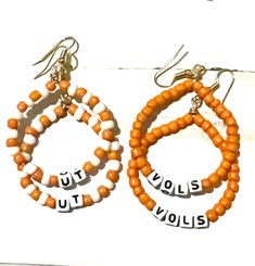 Hand beaded Ut V/Vols Earrings,  Spirit jewelry.  Gameday jewelry.  University of Tennessee Tennessee University, Ut Vols, Trousers Pattern, Go Vols, Tennessee Vols, Vendor Events, University Of Tennessee, Jewelry Earrings Hoops, Hand Beading