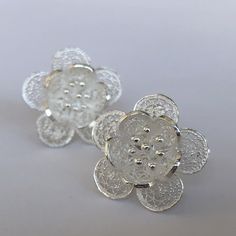 "Silver Flower Earrings Flor de Primavera - Filigree Earrings - Filigree Jewelry - Silver Stud Earrings - Flower Studs - Flower Stud Earrings Filigree - delicate jewellery technique made from silver or golden threads \"embroidering\" kind of metalwork lace that is specific to Spain, especially an Andalusian town Cordoba, where they call it a cordobese filigree. This craftsmanship has been passed from generation to generation, nonetheless nowadays there are very few craftsmen left who know to per Silver Flower Earrings For Pierced Ears, White Clip-on Flower Earrings, White Flower Clip-on Earrings, Elegant Silver Flower Clip-on Earrings, White Clip-on Flower Earrings For Gifts, Silver 3d Flower Earrings, Sterling Silver Earrings With 3d Flowers, Silver Sterling Earrings With 3d Flowers, Silver Flower Clip-on Earrings