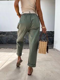 Rise to new denim heights with our Mandy High Rise Denim Pants in Sage. These stylish pants feature a high rise waist to accentuate your curves while providing a comfortable fit. Perfect for any occasion, these pants are a must-have addition to your wardrobe. (Belt not included). Size Guide: Influencer is 5’6” tall, and has a 33.25” bust, 26.5” waist, & 35.6” hips. She is wearing a S / US 4 / AU 8. This pants is true to size. Material: 55% Cotton. 45% Nylon. Feature: High Rise. Straight Leg. Elastic waistband. Side Pocketed. Not lined. Care Instructions: Machine wash / Cold hand wash Spring High Rise Leather Pants, Trendy Denim Belted Bottoms, Fall High Waist Baggy Bottoms, Green Non-stretch Trousers Jeans, Non-stretch Casual Cargo Jeans For Spring, Non-stretch Green Jeans, Casual High Waist Belted Jeans, Casual High-waist Belted Jeans, High Waist Jeans With Pockets