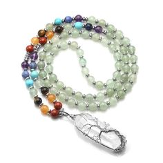 PRICES MAY VARY. 【Unique Design】 Rock crystal quartz Column Size:58-65mm(length),13-15mm(width);Round Beads Diameter:6mm,Necklace Overall length:29"(73.6cm,not adjustable). 7 Chakras Inclued: amethyst,sodalite,synthetic blue turquoise,green aventurine,yellow tiger eye,red aventurine,red jasper. Weight: 56g/pc. Qty:1pc/pack. Each order comes with Elegant Gift Box and Jovivi Velvet Pouch! 【Chakra Pendant Necklace】Our Crystal Necklace has many healing properties to help with energy healing and chak Healing Crystals Necklace, Chakras Healing, Green Aventurine Necklace, Anklet Chain, Energy Balancing, Crystals Necklace, Aventurine Necklace, Ring Keychain, Chakra Pendant