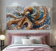 an octopus painting hanging on the wall above a bed in a bedroom with pink linens