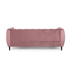 a pink velvet sofa with black legs and an upholstered back, on a white background