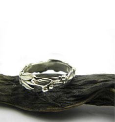 Silver twig stack ring, olive branch stacking ring in sterling silver size 5 , 5,5 - 6 - 10 Olive tree branch band ring in sterling silver . All around the band of the ring are small leaves and granules as olives cast in sterling silver. It is 5 mm wide and is lovely by itself but also nice stack with others. This ring at the pictures is US size 5.5 . I have ready size 5.5, 6 and 10 and you can select them from the sizes menu. Any other size can be done in a couple of days , so If you need anoth Nature-inspired Stackable Jewelry For Anniversary, Nature-inspired Stackable Jewelry For Anniversaries, Everyday Nature-inspired Sterling Silver Rings, Nature-inspired Adjustable Stackable Rings For Promise, Silver Stackable Promise Rings With Nature-inspired Style, Silver Nature-inspired Stackable Rings For Promise, Nature-inspired Silver Stackable Rings, Nature-inspired Silver Stackable Jewelry, Nature-inspired Stackable Silver Jewelry