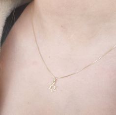 14k solid Gold necklace, star of david gold necklace ,14k gold, everyday necklace, Real Gold Jewelry, Jewish Necklace, Star of david gold necklace Solid 14k Gold necklace with star of david charm hangs on delicate 14k solid gold box chain. **Pendant: Height- total includ loop  15mm / 0.59 inch , width:  10mm / 0.39 inch . **Necklace Lenght:  choose- 16.5 inch/ 41 cm  or  17.5 inch / 44 cm" **14k solid yellow gold box chain.  Please note Please make sure the length of the chain is suitable for yo Yellow Gold Charm Necklace With Star Of David Charm, 14k Yellow Gold Star Of David Necklace, Dainty Yellow Gold Star Of David Necklace, Magen David Necklace, Jewish Star Necklace, Jewish Necklace, Star Of David Necklace, Jewish Star, Necklace Star