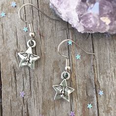 "Cute Star Earrings with Smile Face Star face charm about 1/2\". Star is zinc alloy. Surgical steel ear wires. Your earrings will come in an organza bag to gift or keep for yourself. Bubble wrapped for safe travel. Flat rate shipping no matter how much your order. To view a personalized sun necklace click here: https://www.etsy.com/listing/292929419/sun-initial-birthstone-choker-custom-sun?ref=shop_home_active_3 To view other earrings: https://www.etsy.com/shop/Beadaboutique?ref=ss_profile§ion_i Moon Face Earrings, Star Face, Earrings Moon, Cute Star, Sun Necklace, Moon And Star Earrings, Face Earrings, Cute Stars, Men Earrings