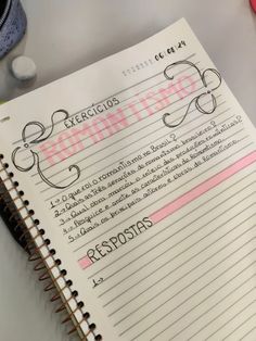 an open notebook with writing on it