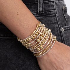 Handmade in Brazil, the Bianca Wrap Bracelet will amplify any casual outfit you have on. This stunning statement piece is Brazilian gold filled featuring a fabulous multi wrap design with small and large gold beads. Brazilian Gold Filled 2.5" diameter Hypoallergenic Water & Tarnish Resistant Brazilian Gold, Sunglass Chain, Jewelry Studio, Original Gift, Cz Stone, Gold Beads, Ring Bracelet, Casual Outfit, Jewelry Care