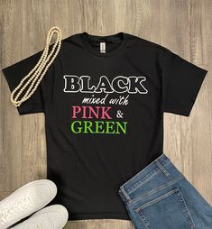 Attention Sorors...catch everyone's eye with this cute, comfy cotton tee. Black mixed with Pink and Green!