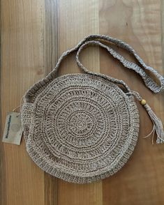 Casual Handmade Adjustable Shoulder Bag, Casual Adjustable Handmade Shoulder Bag, Bohemian Jute Shoulder Bag With Adjustable Strap, Bohemian Woven Crochet Travel Bag, Bohemian Jute Bag With Tassels, Beige Bohemian Crochet Bag For Daily Use, Casual Crochet Bag For Festivals, Casual Woven Crochet Bag For Festival, Bohemian Macrame Bags As Gift