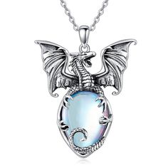 Discover our exquisite Sterling Silver Dragon Pendant Necklace, adorned with a captivating blue moonstone, blending retro silver aesthetics with a unisex design for a truly magical allure. Crafted from highquality sterling silver, this pendant necklace marries the mythical elegance of a dragon motif with the enchanting glow of a moonstone, offering unique shapes that captivate and inspire. The rich blue hue of the moonstone complements the retro silver finish, making it a versatile piece suitabl Moonstone Dragon, Necklace Dragon, Dragon Motif, Celtic Knot Pendant, Silver Dragon Necklace, Photo Locket Necklace, Sterling Silver Anklet, Dragon Necklace, Unique Shapes