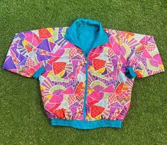 Vintage Multicolor Windbreaker Good Vintage Condition No Tag Each Vintage item is unique and fits differently. Please refer to measurements for the best fit. Size Medium Width 24.5 inch Length 26.5 inch *Follow LegacyVintage on Instagram* * I ship all items in two or three business days and utilize Priority Mail options via USPS. Expedited shipping is available upon request. If you have any questions; Please Ask! * All of my items are pre-owned and, unfortunately, sometimes have scuffs, stains, Retro Pink Patchwork Outerwear, 90s Multicolor Streetwear Outerwear, Pink Retro Patchwork Outerwear, Pink Patchwork Retro Outerwear, Retro Multicolor Windbreaker For Fall, 90s Style Multicolor Windbreaker For Spring, 90s Style Multicolor Spring Outerwear, 90s Multicolor Spring Outerwear, Retro Multicolor Windbreaker For Winter