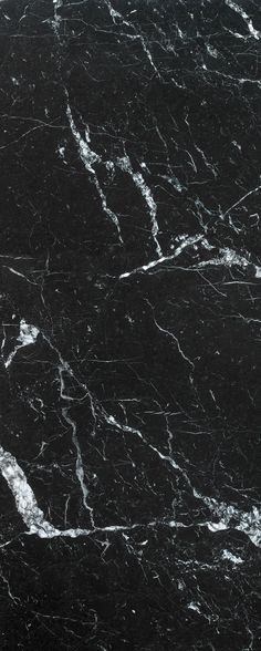 black marble with white streaks on it