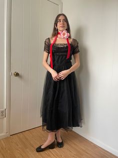 Condition: Great, the tulle is a bit brittle, but the dress is still entirely wearable.  Fits like a small, please see measurements for exact details----> Bust 17 Waist 12 Hips 18 Shoulder to Waist 15 Waist to Hem 31 Model wears a size XS/S and is 5'2. All measurements are taken flat in inches! When considering fit, compare it to a garment you own that fits well. For waist and hip measurements, double it to get the full circumference.  *All items are vintage and pre-loved. All major flaws are listed, but small blemishes like loose stitches and buttons may not be in the item description as they are to be expected when purchasing vintage items.  **We do not accept returns unless you believe that item was misrepresented in our shop. Please message us and ask questions! We would love to take t Costume Dress With Fitted Bodice In Tulle, Tulle Dress With Fitted Bodice For Costume, Elegant Tulle Costume Dresses, Elegant Tulle Dresses For Costume Events, Elegant Tulle Dresses For Costume, Vintage Tulle Dress For Formal Occasions, Fitted Tulle Dress For Costume, Vintage Fitted Tulle Dress, Fitted Vintage Tulle Skirt Dress