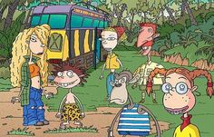 the cartoon characters are standing in front of a train and some people with large eyes