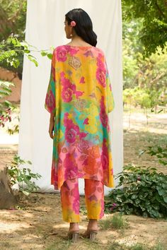 Multi colored boxy kaftan kurta with floral prints. Comes with coordinating printed pant. - Aza Fashions Multicolor Silk Straight Kurta Set, Bohemian Multicolor Lawn Suit With Printed Motifs, Festive Multicolor Lawn Suit For Summer, Multicolor Silk Kurta With Dabka Detailing, Multicolor Silk Sets With Printed Motifs, Multicolor Palazzo Set For Festive Spring Occasions, Festive Multicolor Pant Set With Printed Motifs, Festive Multicolor Printed Pant Set, Multicolor Spring Sets With Dupatta