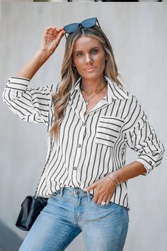 The Black and White Stripe Collared Button-Up Blouse pairs timeless stripes with a sharp collar for a look that’s both professional and stylish. Perfect for adding a touch of sophistication to your workday. Product code: CAA04D4G019AC Features:  Woven Collared neckline Drop shoulder Long sleeves Breast pocket Front buttons Pattern: Stripes Wash Method: Regular Wash Material: 100%POLYESTER. Striped Blouse Outfit, Button Shirt Outfit, Stripe Outfits, Swimwear Beach, Button Up Blouse, Striped Blouse, Beach Dresses, White Long Sleeve, Striped Shirt