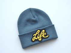 Every days a beanie day! Personalised Unisex Beanie with the wording badge Life sewn own Material: 100% soft feel acrylic Double Layer Knit Cuffed Design Available in an array of fantastic colours and perfect for everything from the school run to the skate parkand more! Made from 100% soft feel acrylic it feels great, looks good is hard wearing, easy to care for and will keep your head nice and toasty. One size Each hat is embroidered to order so please note returns are not permitted Wooly Hats, Embroidered Beanie, Knitted Beanie, Skate Park, Skull Cap, Knit Beanie, Caps Hats, Accessories Hats, Winter Hats