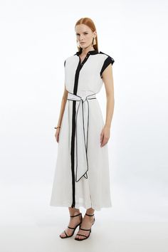 Bring In The Summer With Our Midi Dress, Made In Lightweight Fabric, With A High, Military Inspired Neckline, And Buttons Down The Centre. The Belted Waistline Cinches In The Relaxed Silhouette, And Can Easily Be Styled With A Pair Of Sandals Or Heels For A Failsafe Summer Look. Military Mono Sleeveless Belted Woven Midi Dress Button Front Detailing High, Military Style Neckline Ultra Relaxed Fit Tie Waist Belt Sheer Skirt Detailing Button Front Fastening Bride Jumpsuit, Petite Wedding Guest Dresses, Wedding Pants, Plus Size Workwear, Summer Bridesmaid Dresses, Miami Outfits, Honeymoon Outfits, Italy Outfits, Outfits Petite