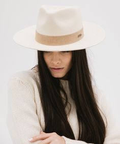 Holly blends two of our most beloved hats into one special silhouette. Miller’s semi-tall fedora crown paired with Monroe’s mid-length upturned brim makes this hat both bold + approachable. Featuring a hand-sewn suede band that’s easy to layer with other accessories. This is a style meant for all hat wearers from novices to pros. Named after our friend Holly, founder of Our Faux Farmhouse, who teamed up with us for this design. Modern Wide Brim Hat For Everyday, Modern Adjustable Brimmed Fedora, Modern Wide Brim Fedora For Everyday, Modern Fitted Hat With Flat Brim, Modern Fedora With Short Brim For Everyday, Modern Fitted Fedora With Flat Brim, Modern Fedora With Adjustable Fit And Short Brim, Modern Curved Brim Hat For Fall, Spring Fur Felt Hat With Curved Brim