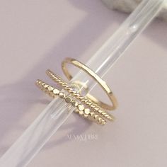 Elevate your style with our handcrafted 14k gold-filled stacking rings. Each ring is meticulously crafted, ensuring that every piece carries the artistry of handmade excellence. The result? A one-of-a-kind ring, as unique as you. These ones can be your everyday rings. Getting this set you're saving 10% already! Handcrafted in USA Sold by set of 3 rings DETAILS: Material: 14/20 Gold filled Dimensions: Width 1.3mm ~ 1.5mm Note: As each piece is totally handcrafted dimensions and shapes can slightl Trio Rings, Extraordinary Jewelry, Trio Ring, Gold Bond, Everyday Rings, Oils For Skin, Gold Filled Jewelry, Organic Beauty, Natural Pearls