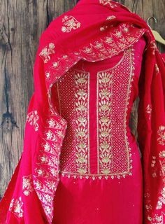 Item Overview ATHARVA Hand Embroidery Salwar Kameez Hot Pink/Zardozi Gota Pati Neck/Banarsi Silk Dupatta/Custom Stitch Unstitch/Wedding/Custom Anarkali Dno. CH1682 Fabric: * Shirt: Chanderi Silk - Hot Pink- 2.5 Mts, with Beautiful Embroidery Neck * Dupatta: Hot Pink Banarsi Silk Dupatta with Swaroski highlight (Motifs may wary) * Salwar: Santoon Silk 2.5 Mts. Excusive Hand Embroidered Party Wear Punjabi Suit. Customization: * Fabrics Customization: Designs Can be made in different Fabrics. *Colo Dola Silk Anarkali Set With Intricate Embroidery, Festive Chinon Salwar Kameez With Intricate Embroidery, Embroidered Chinon Kurta For Wedding, Churidar With Resham Embroidery In Art Silk, Art Silk Churidar With Resham Embroidery, Straight Kurta Churidar With Resham Embroidery In Art Silk, Festive Straight Kurta Salwar Kameez With Intricate Embroidery, Anarkali Salwar Kameez With Intricate Embroidery For Diwali, Kundan Churidar With Intricate Embroidery For Wedding