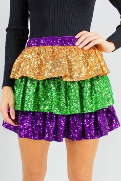 Head to your Mardi Gras parties in style! Pair this jazzy skirt with a simple sweater and cowgirls boots for a fun outfit. Top your look off with a rhinestone headband!  Runs True to Size Model is Wearing a Small Material: 100% Polyester Hand Wash Cold, Hang or Line Dry Iron Low if Needed Do Not Bleach Imported Sizing Cowgirls Boots, Store Inspiration, Simple Sweater, Mardi Gras Outfits, Outfit Top, Simple Sweaters, Mardi Gras Party, Dog Store, Concert Outfits