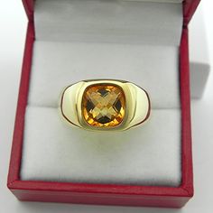 This is as fine and elegant a man's ring as you will ever find. The perfect blend of a fine gemstone matched up with a clean classic 14K yellow gold ring. Good solid weight, nicely distributed to give the ring an even weight so that it will not spin. There is nothing worse than a top heavy ring that constantly spins, or flip flops back and forth. A good weighty ring should be balanced so that it stays in place. The inside of the shank is solid to increase the comfort level of the ring. The beaut Classic Yellow Topaz Ring For Formal Occasions, Elegant Citrine Signet Ring For Formal Occasions, Elegant Formal Citrine Signet Ring, Elegant Yellow Signet Ring For Formal Occasions, Classic Yellow Topaz Ring With Polished Finish, Classic Citrine Signet Ring For Anniversary, Classic Yellow Topaz Ring, Classic Gold Citrine Signet Ring, Yellow Signet Ring With Polished Finish For Formal Occasions