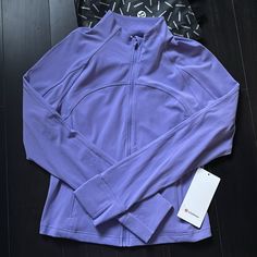 Brand New With Tags Lululemon Nulu Cropped Define Jacket Color Dark Lavender (Dkla) Size 12 Sold Out! Please Note I Do Not Accept/Respond To Low Ball Offers Reasonable Offers Only Please And Thank You Guaranteed Authentic 5 Star Top Rated Seller Next Day Shipping B767 Lululemon Define Jacket Purple, Winter Sports Activewear In Purple, Purple Athleisure Activewear For Fall, Purple Athleisure Outerwear For Sports, Purple Winter Workout Outerwear, Winter Workout Purple Outerwear, Winter Workout Outerwear In Purple, Purple Fall Activewear For Gym, Purple Long Sleeve Activewear For Gym