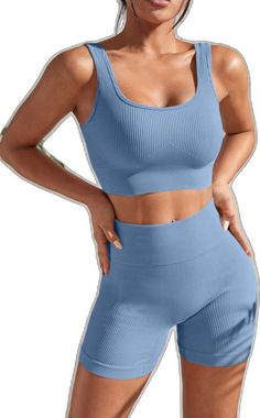 Sporty Solid Color Ribbed Activewear, Sporty Solid Ribbed Activewear, Solid Color Ribbed Sporty Activewear, Fitted Blue Ribbed Activewear, Fitted Ribbed Blue Activewear, Blue Ribbed Athleisure Tops, High Stretch Ribbed Activewear For Loungewear, Ribbed High-stretch Activewear For Loungewear, Blue Ribbed Activewear For Gym