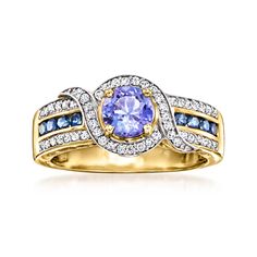 Ross-Simons - .90ct Tanzanite, .26ct t. w. Diamond Ring, .20ct t. w. Sapphires. Size 9. Shimmery diamonds and vibrant gemstones come together in this spectacular statement ring! At the center, a .90 carat round tanzanite beams its regal purple hue, as .26 ct. t. w. diamond rounds dance along stylized curves and wrapped borders. In between, a lush splash of .20 ct. t. w. round sapphires completes the elegant aesthetic. Finely crafted in polished 14kt yellow gold. 3/8" wide. Sapphire, diamond and Tanzanite Engagement Ring, Sapphire Birthstone, Tanzanite Jewelry, Round Sapphire, Elegant Aesthetic, Tanzanite Ring, Fine Jewelery, Purple Hues, Sapphire Diamond