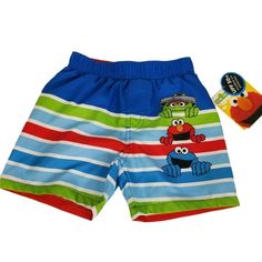 * Sesame Street Infant Boys Swimsuit * Size: 3/6 Months, Infant * Color: Blue, Green, Red, Multi-Color * Material: 100% Polyester * Care: Machine Wash, Low Tumble Dry * Upf 50+ * New With Tags, Tags May Have Shelfwear * Please See Pictures For More Details * Thank You For Looking Fun Blue Swim Trunks For Beach Season, Fun Blue Bottoms For Poolside, Playful Blue Swim Trunks For Poolside, Fun Blue Poolside Bottoms, Playful Blue Shorts For Beach Season, Playful Blue Beach Shorts, Playful Beach Shorts, Playful Blue Short Swimwear, Fun Blue Beach Shorts