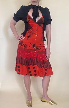 "Ossie Clark Dress in Red and Black Celia Birtwell Print. Made of Crepe Moss Peplum at Waist, Buttons at Front, and Tie Front.  Has has Fabric Added to Underarm in Black Satin to Add Width ti Bust/Shoulder.  Missing Label *Shorts in images are NOT INCLUDED, they are Sold Separately in my Listings. Measurements:  Bust: 33\" Waist 27\" Hips 39\" Length 52\" Condition: Good Has Some Fading of the Black Fabric at Sleeves, Fabric added to Underams and Sleeves for Width, MisMatched Buttons, and a Few Red Dress With Retro Print For Summer, Retro Fitted Rayon Dresses, Fitted Dress With Retro Print And Short Sleeves, Red Retro Print Dress For Spring, Fitted Retro Print Short Sleeve Dress, Retro Fitted Midi Dress With V-neck, Red Retro Print Dress For Summer, Fitted Orange Dress With Retro Print, Fitted Vintage Rayon Dress