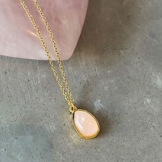 Introducing our new Simple Rose Quartz Necklace! This elegant necklace is made with a high-grade rose quartz gemstone, and is 18k gold plated for a luxurious look. Rose quartz is known as a metaphysical crystal, and it is a symbol of love, peace, and self-care. It's the perfect gift for yourself or a loved one and comes in a beautiful Asana jewelry box. Order now while supplies last!

 

 	Size: 18 inches
 	Free Shipping 2 Days
 	Authentic Pink Stone: Rose Quartz
 	18k Gold Plated Rose Quartz Necklace Pendants, Simple Rose, Rose Quartz Pendant, Rose Quartz Necklace, Rose Quartz Gemstone, Elegant Necklaces, Pink Stone, Quartz Pendant, Quartz Necklace