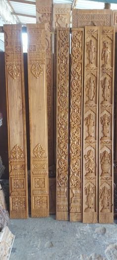 carved wooden doors are lined up against the wall