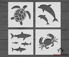 four different stencils with sea animals and fish on them, each one has a turtle