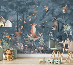 an animal themed wallpaper mural in a children's room