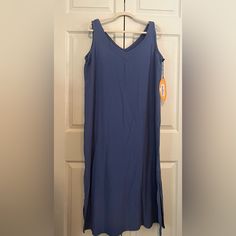 This Is A Sleeveless Cotton Gauze Dress With An Embroidered Strap And A Ruffled Hemline. It Is New With Tags. Measurements: Center Front Length 42" Bust 44'| Sleeveless Summer Maxi Dress For Loungewear, Blue Sleeveless Maxi Dress For Loungewear, Sleeveless Cotton Maxi Dress For Loungewear, Casual Sleeveless Maxi Dress For Loungewear, Sleeveless Stretch Maxi Dress For Loungewear, Sleeveless Solid Color Midi Dress For Loungewear, Solid Sleeveless Midi Dress For Loungewear, Blue Sleeveless Maxi Dress For Daywear, Blue Casual Midi Dress For Loungewear