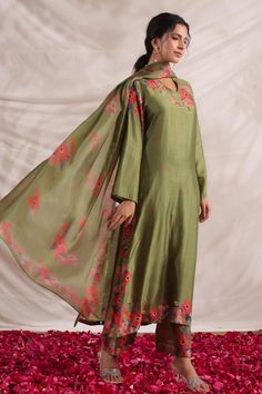 Green silk kurta with multi color placement floral print, sequin, bead and French knot thread embroidered highlights. Paired with printed palazzo and dupatta.
Components: 3
Pattern: Printed and Hand Embroidered
Type Of Work: Floral Print, Bead, Sequin and French Knot Thread Work
Neckline: V Neck
Sleeve Type: Full Sleeves
Fabric: Silk, Dupatta: Mulberry Silk
Color: Green
Other Details: 
Bead tasselled dupatta edges
Side slits
Embroidered highlights
Model height: 5ft inches, wearing size S
Occasio Knot Thread, Kurta Palazzo Set, Kurta Palazzo, Palazzo Set, Silk Kurta, French Knot, Silk Dupatta, Fabric Silk, Thread Work