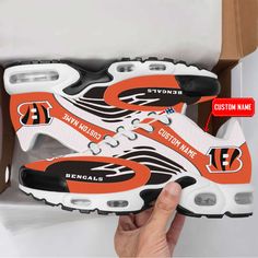 Cincinnati Bengals NFL Premium Air Max Plus Sport Sneakers For Fan Gifts White Throwback Custom Sneakers For Sports, Throwback Low-top Sneakers For Sports Events, Low-top Basketball Shoes With Logo Print, Fade-resistant Synthetic Basketball Shoes For Sports Events, Fade-resistant Synthetic Basketball Shoes For Sports, Throwback Basketball Shoes For Sports Season, Custom White Sneakers For Sports Season, White Custom Sneakers For Sports Season, Collegiate White Basketball Shoes For Sports Events