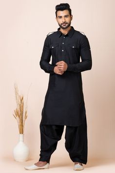 Elevate your ethnic wardrobe with our sophisticated Readymade Pathani Kurta Pyjama Set, crafted from luxurious Viscose fabric. This ensemble is designed for those who appreciate the perfect blend of tradition and contemporary style, making it an ideal choice for function wear. Black Cotton Sherwani With Long Sleeves, Black Cotton Sherwani With Straight Kurta Shape, Black Bollywood Unstitched Suit For Navratri, Black Cotton Sherwani Straight Kurta, Festive Black Cotton Sets, Black Unstitched Suit For Designer Wear, Navratri, Black Designer Unstitched Suit For Navratri, Black Designer Wear Unstitched Suit For Navratri, Designer Black Kurta With Self Design