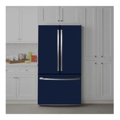 a blue refrigerator freezer sitting in a kitchen next to white cabinets and cupboards