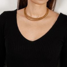 woman in 3-strand gold snake necklace and black shirt Adjustable Gold Necklace With Silk Cord, Elegant Gold Necklace With Adjustable Cord, Gold Silk Cord Necklaces As Gift, Gold Silk Cord Necklaces For Gifts, Gold Silk Cord Necklace For Gift, Adjustable Gold Brass Jewelry With Cord, Gold Brass Jewelry With Adjustable Cord, Gold Adjustable Cord Choker Necklace, Gold Choker Necklace With Adjustable Cord