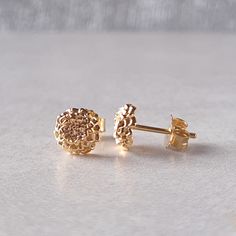 Celebrate October birthdays with these stunning gold-plated sterling silver marigold stud earrings, the birth flower for October. The marigold flower, known for symbolizing passion, creativity, and warmth, makes these earrings a thoughtful and meaningful gift for those born in October or anyone who loves floral jewellery. Crafted from high-quality sterling silver and finished with a lustrous gold plating, these delicate marigold stud earrings are perfect for adding a touch of elegance and charm Yellow Gold Birth Flower Earrings Gift, Yellow Gold Flower Cluster Earrings For Anniversary, Yellow Gold Plated Flower Earrings For Anniversary, Gold Earrings With Birth Flower For Anniversary, Gold Birth Flower Shaped Earrings, Gold Birth Flower Earrings For Anniversary, Gold Birth Flower Earrings For Gift, Yellow Gold Round Flower Earrings For Anniversary, Gold Sterling Silver Cluster Earrings For Anniversary