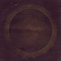 an image of a circular design in gold on purple paper with the words,'it is