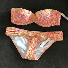 Brand New With Tags. Only Selling As A Set. Do Not Ask For Separates. Top Is Size 34b With Bottoms Xs. Super Cute And Sexy. Strapless Top With Sparkly Beautiful Orange Print And Bottoms Side Rushing Detail. Look For My Other Swim Sets. Soak Up The Sun. Victoria's Secret Fitted Swimwear For Spring, Fitted Victoria's Secret Swimwear For Spring, Victoria's Secret Fitted Yellow Swimwear, Fitted Yellow Victoria's Secret Swimwear, Soak Up The Sun, Orange Print, Swim Sets, Victoria Secret Swim, Orange Yellow