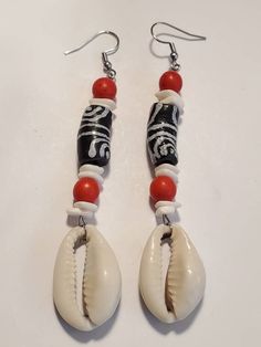 Check out this item in my Etsy shop https://www.etsy.com/listing/1022248552/black-white-ghana-krobo-cowrie-shell Chandbalis Earrings, Ocean Springs Ms, Krobo Beads, Ocean Springs, Pumpkin Bead, Jewelry Making Earrings, Statement Choker Necklace, African Beads, Cowrie Shell