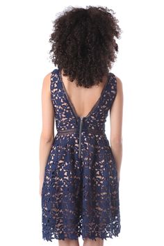 Introducing our stunning Blue Eyelash Lace Mini Dress, a gorgeous addition to our exclusive collection. This dress is perfect for any special occasion, with its beautiful floral eyelash lace and full lining that ensures both comfort and coverage. The V-neckline and V-back add a touch of elegance, while the back zip fastening ensures a secure and comfortable fit. The blue color of the dress is sure to make you stand out and turn heads at any festive event. Crafted from 100% polyester with a linin