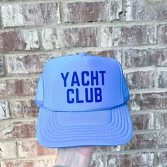 adult sizing; adjustable strap in the back one size fits most! Letter Print Visor Hats For The Beach, Beach Visor Hat With Letter Print, Beach Snapback Visor Hat With Letter Print, Summer Blue Snapback Trucker Hat, Blue Snapback Trucker Hat For Summer, Sporty Blue Hats For Summer, Sporty Blue Summer Hats, Blue Letter Print Hat For The Beach, Blue Letter Print Hat For Beach