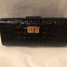 Nwt Elegant Cc Skye Black Leather Crocodile Embossed Clutch. Black Fabric Interior. Flap Closure With Gold Tone Turn Lock Closure At Front. Structured Bag With Rounded Corners. Embossing Is Raised On Front And Back. Large Enough For Phone, Cosmetics, Cards And Keys. Includes Generic Dust Bag. Designer Black Clutch With Rectangular Case, Designer Black Clutch In Rectangular Case, Designer Black Rectangular Clutch, Luxury Black Evening Bag For Business, Evening Clutch Bag With Crocodile Pattern, Evening Leather Bag With Crocodile Pattern, Leather Rectangular Evening Bag, Party Leather Bag With Crocodile Pattern, Black Formal Bag With Crocodile Pattern