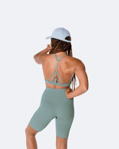 Looking for that one accessory that will kick your sporty look up a notch? Look no further. Whether you’re sweating it out in the gym or just wandering out and about, you can't go wrong with our classic 6-panel design hat. Peak Design, Sweat It Out, Green Tank Top, Strapback Hats, Green Tank, Hat For Women, Sporty Look, Back Strap, Fabric Material